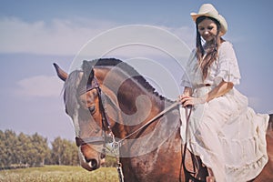 Cowgirl in white dress