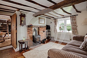 Cottage living room with woodburning fire