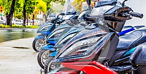 Cowlings on Red and Blue Sports Bikes in Rain