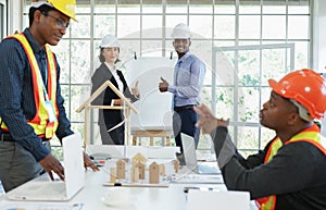 Coworker is talking while engineering project manager and businessman smiling and thumb up to successful business, selective focus