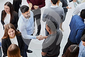 Coworkers having business meeting in a lobby