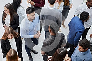 Coworkers having business meeting in a lobby