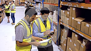 Coworkers scanning products with a barcode scanner