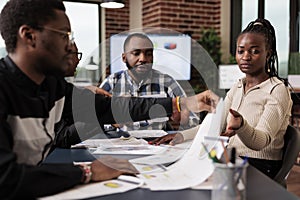 Coworkers team brainstorming ideas in business meeting