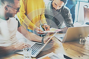 Coworkers Team Work Modern Office Place.Account Manager Showing New Business Idea Startup Presentation.Woman Holding photo