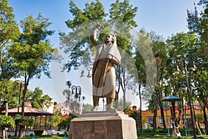 Coyoacan, Mexico City, Mexico-20 April, 2018: Miguel Hidalgo Statue in front of Parish of San Juan Bautista on Hidalgo square in