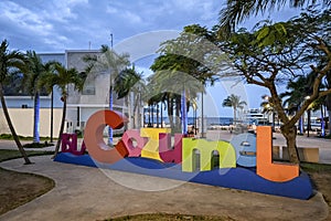The Cozumel selfie sign at dusk on the main square of the island