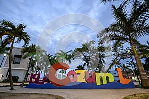 The Cozumel selfie sign at dusk on the main square of the island