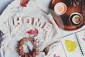 cozy autumn table, top view of still life details in hygge style on white background