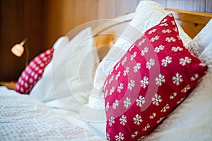 cozy bedroom red pillows hygge