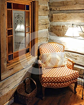 Cozy Chair in a Log Cabin Corner