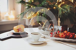 Cozy christmas morning at home with cup of coffee