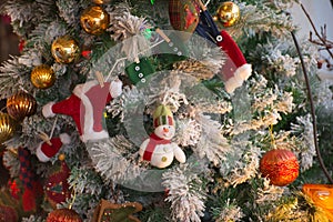 Cozy Christmas still life with a lantern in the form of a star and a New Year tree