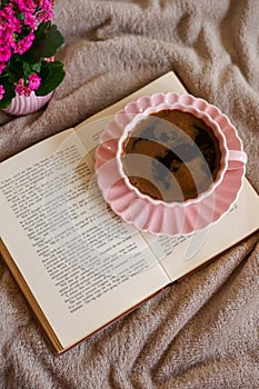 Cozy Coffee and a Book on a Soft Blanket