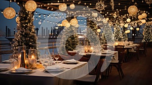 Cozy deck of a cruise ship decorated for Christmas against the background of water. Beautifully set dining tables