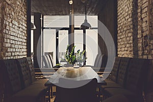 Cozy dining place at window, restaurant background