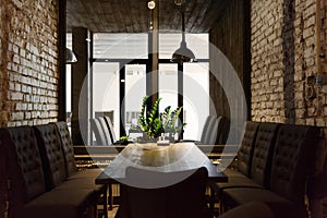 Cozy dining place at window, restaurant background