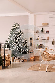 Cozy dining room interior with Christmas tree and festive decor