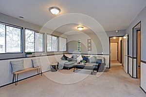 Cozy family room with blue walls and wainscoting