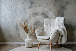 A cozy grey snuggle chair nestled against a textured stucco wall, exuding boho chic vibes, AI generated