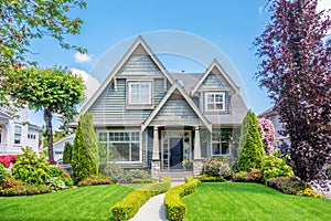 Cozy house with beautiful landscaping photo