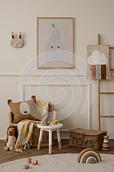 Cozy ids room interior with mock up poster frame, plush toys, brown pillow, braided armchair, round stool, ladder with ornament,