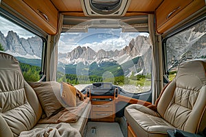 The cozy interior of a motorhome offers a panoramic view of the surrounding mountainous terrain. AI Generate