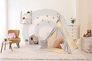 Cozy kids room interior with play tent