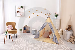 Cozy kids room interior with play tent