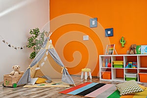 Cozy kids room interior with play tent