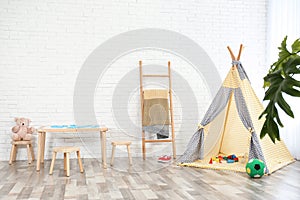 Cozy kids room interior with table