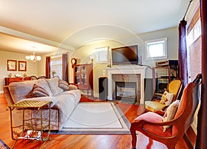 Cozy light tones living room open to dining area