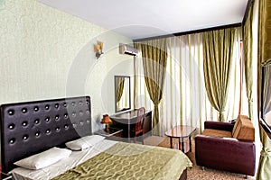 Cozy luxury bedroom interior of hotel