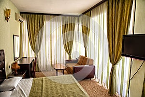 Cozy luxury bedroom interior of rich hotel