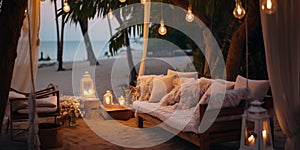 cozy Luxury resort, evening beach, candles blurred light on table ,sofa, hammock on front sunset sea