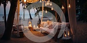 cozy Luxury resort, evening beach, candles blurred light on table ,sofa, hammock on front sunset sea