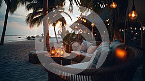 cozy Luxury resort, evening beach, candles blurred light on table ,sofa, hammock on front sunset sea