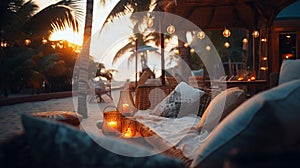 cozy Luxury resort, evening beach, candles blurred light on table ,sofa, hammock on front sunset sea