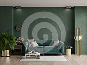 Cozy modern living room interior with green sofa and decoration room on empty dark green wall background
