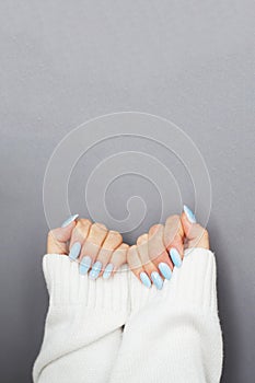 Cozy nails with winter manicure with snowflakes