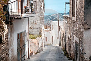 Cozy narrow street in Pano Lefkara village. Limassol District, C