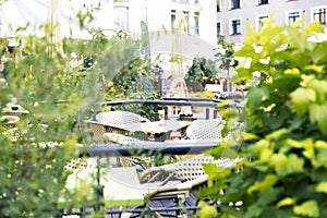 Cozy outdoor cafe. Tables and chairs at restaurant terrace