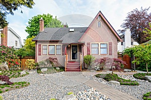 Cozy pink house with a beautiful garden