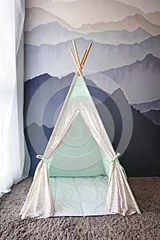 Cozy play tent for kids in child room