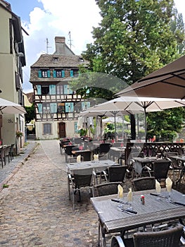 Cozy restaurants by the canal, in the quaint streets of Little France, Strasburg.