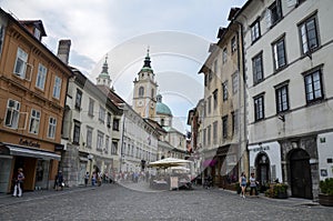 Cozy street with beautiful colorful buildings in the old town historic center of Ljubljana, Slovenia