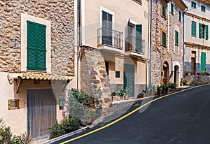 A cozy street  with flowers in the old town of Banyalbufar