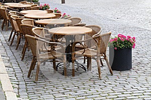 Cozy street restaurant. Tables and chairs in the streets