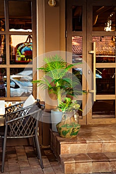 cozy summer cafe, restaurant, with a stylish interior and furniture