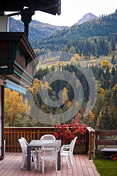 Cozy terrace with a table and chairs